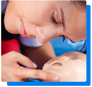 woman performing CPR on child manikin
